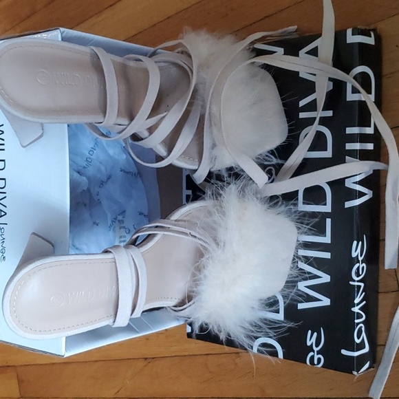 Fluffy faux feathers outline the top strap of this square-toed sandal with wrap- - Picture 6 of 7